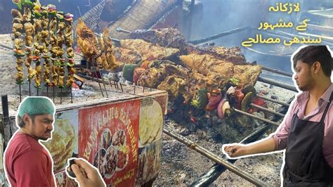  Sajji: Uma festa de especiarias e carne assada lentamente em uma brasa picante!